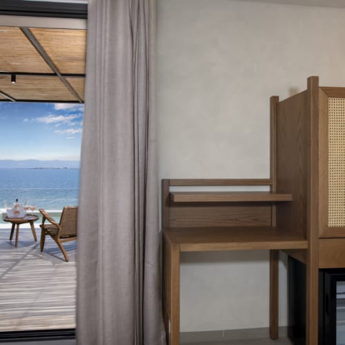 a room with a table and chairs