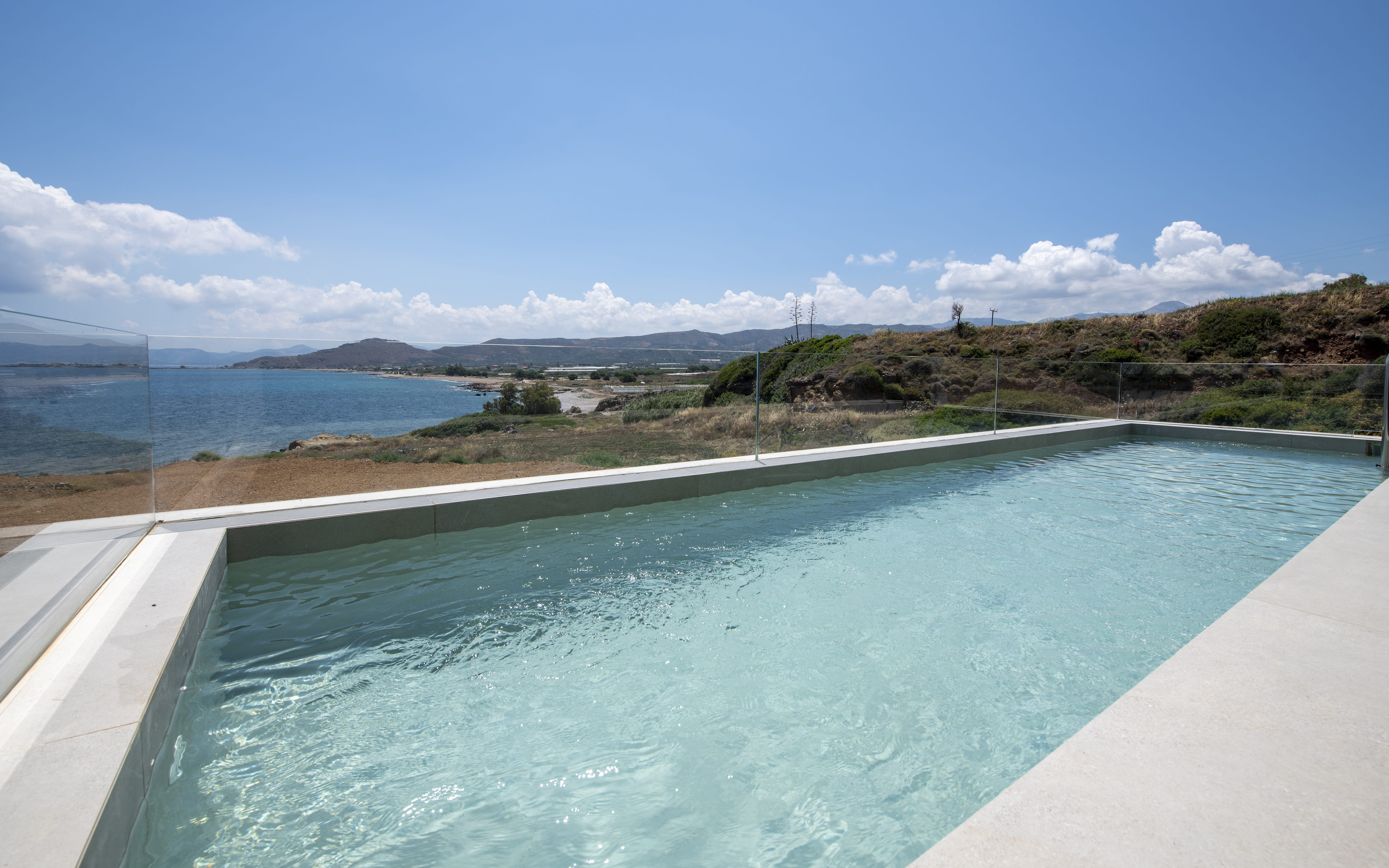 a body of water with land in the back