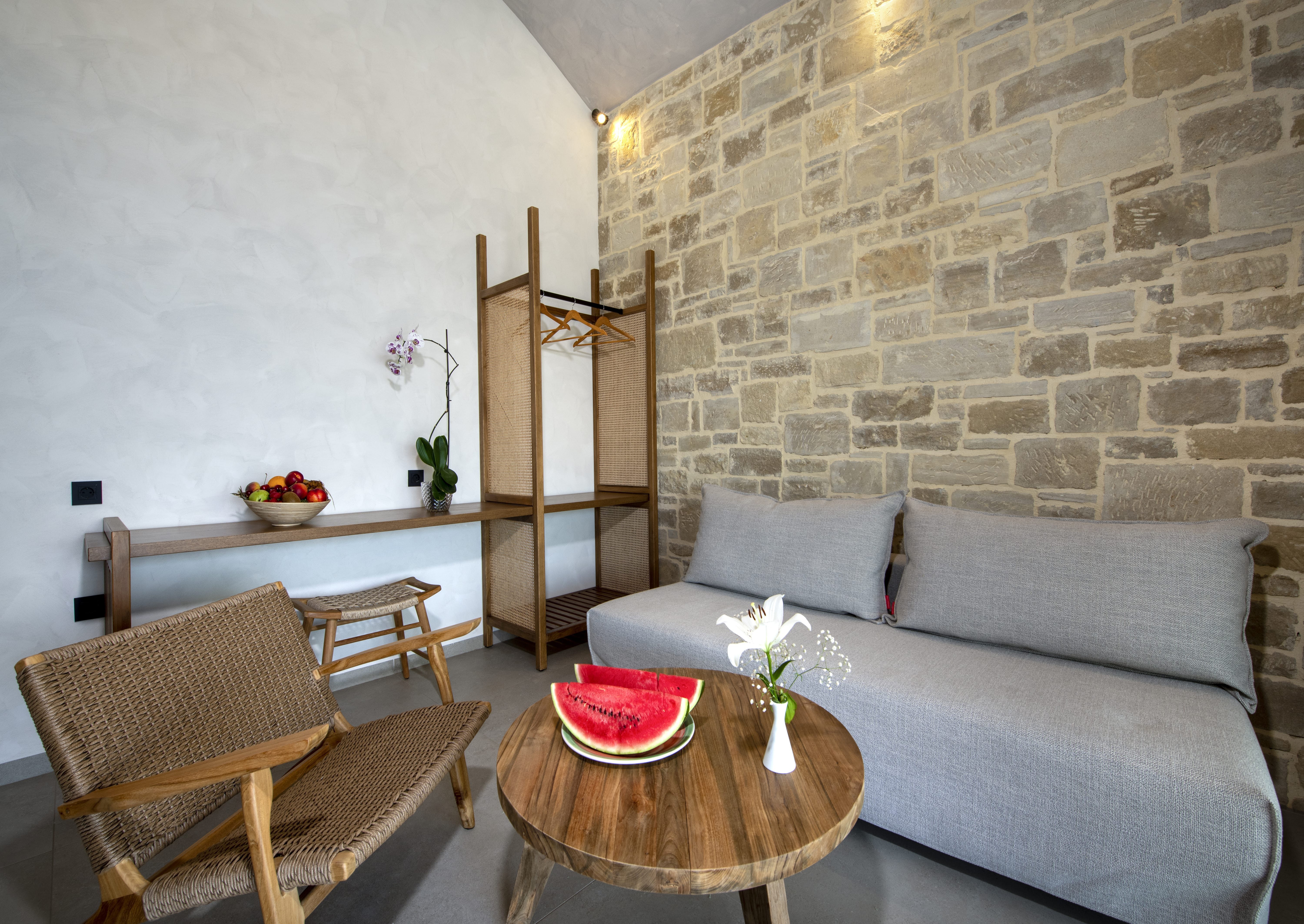 a living room with a couch and a table