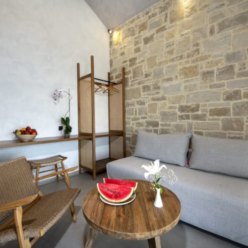 a living room with a couch and a table
