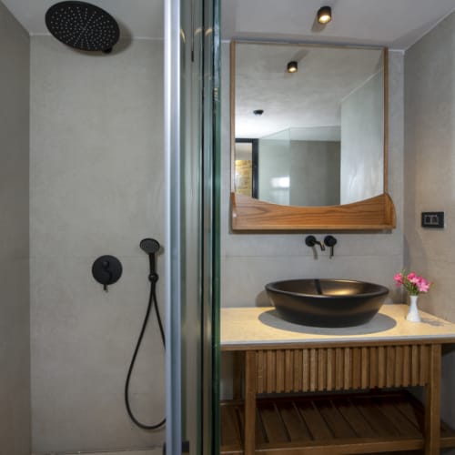 a bathroom with a sink and a mirror