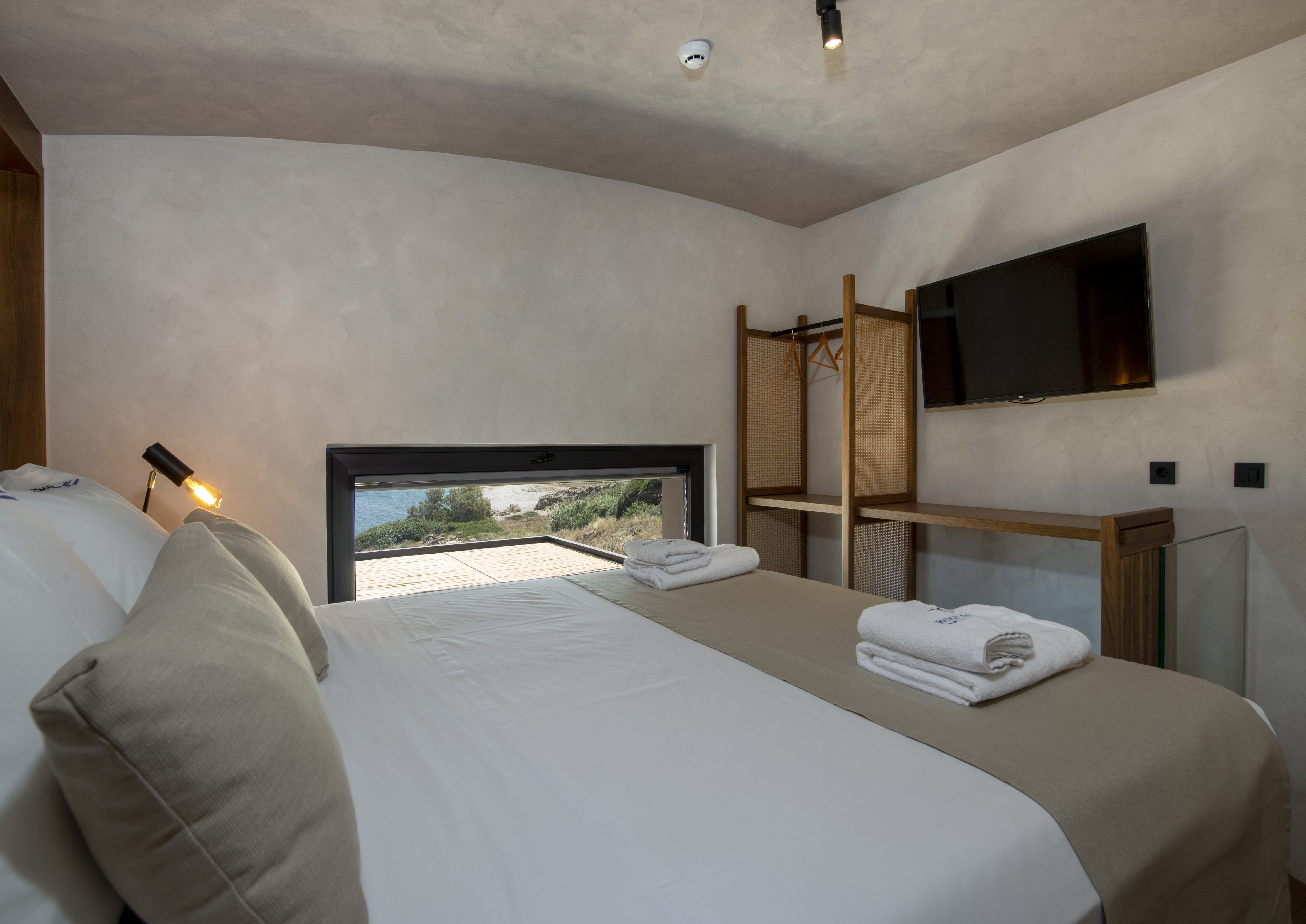 a bed with a white sheet