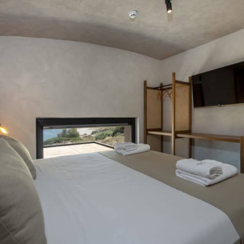 a bed with a white sheet