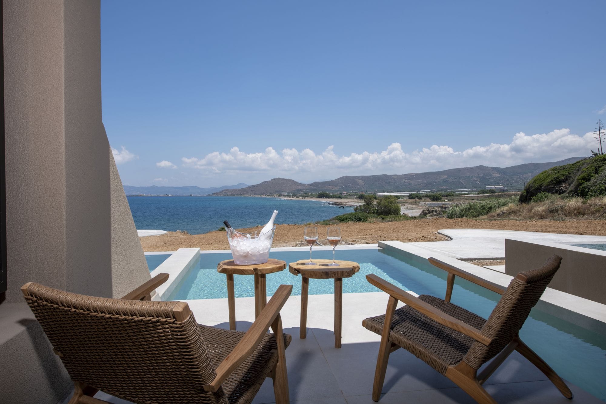 a table and chairs on a balcony