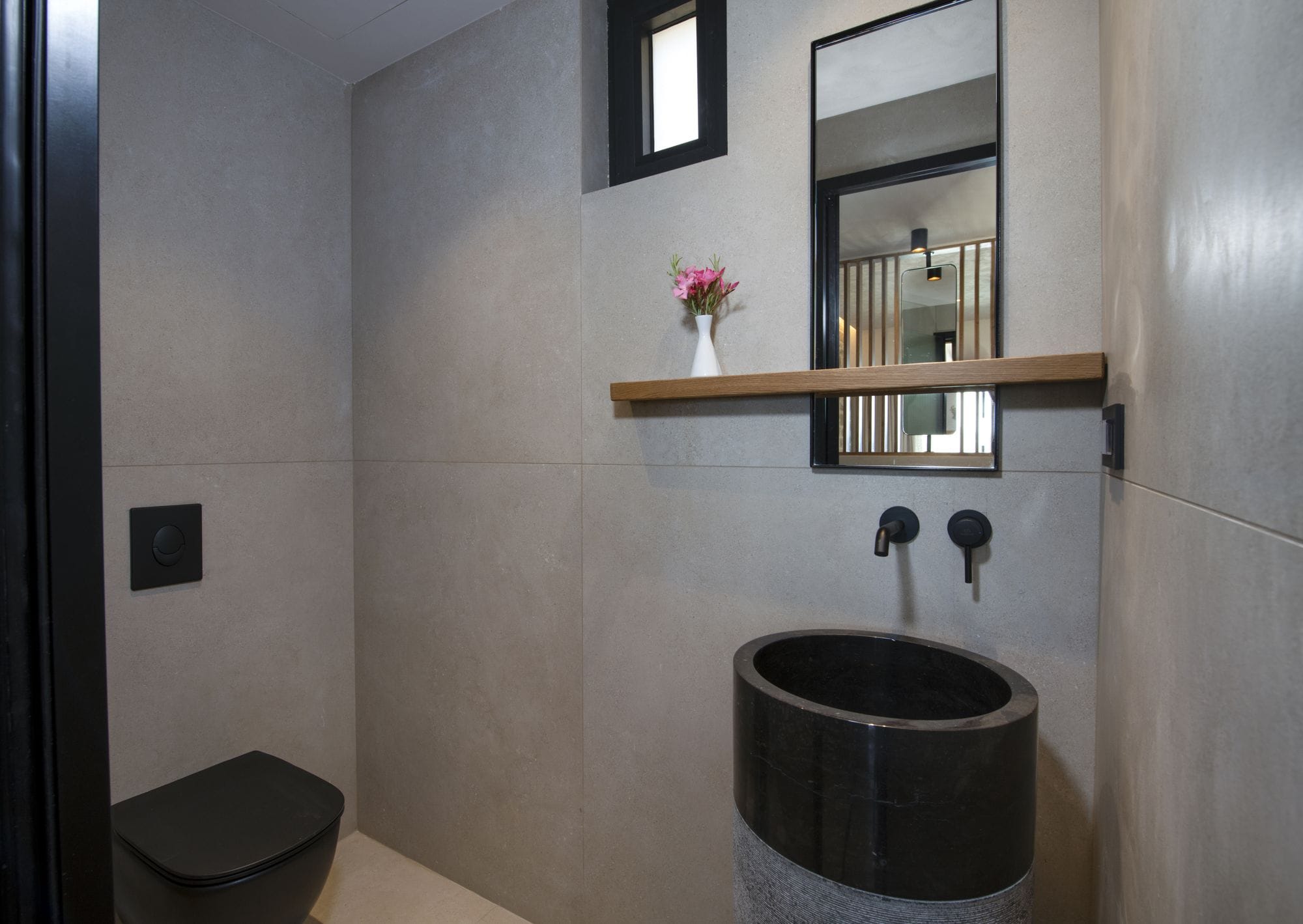 a bathroom with a sink and mirror