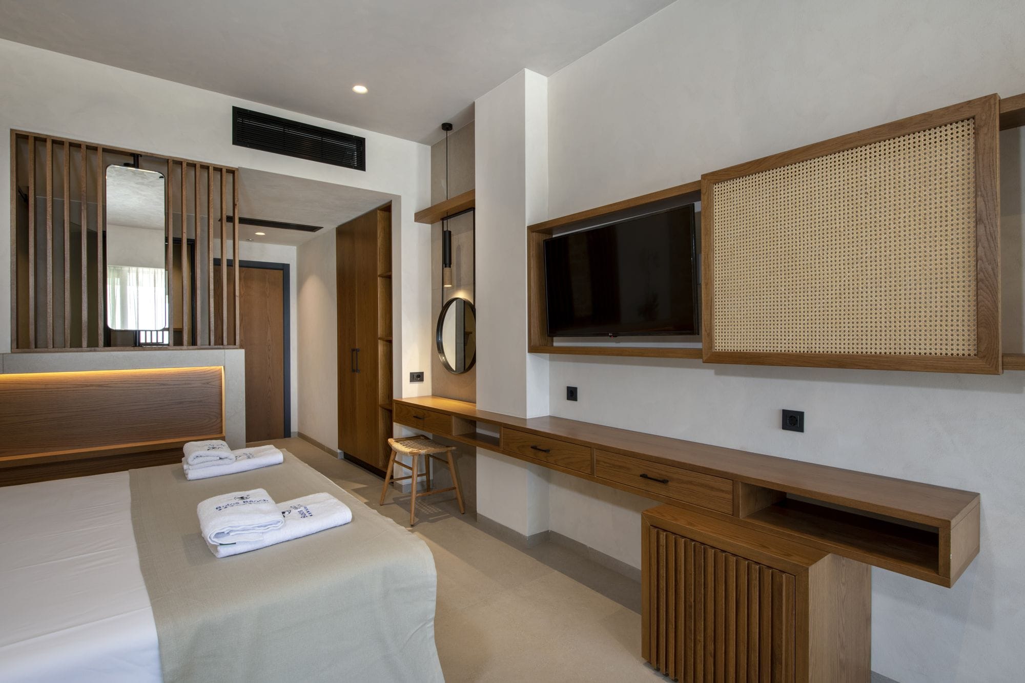 a room with a counter and a microwave