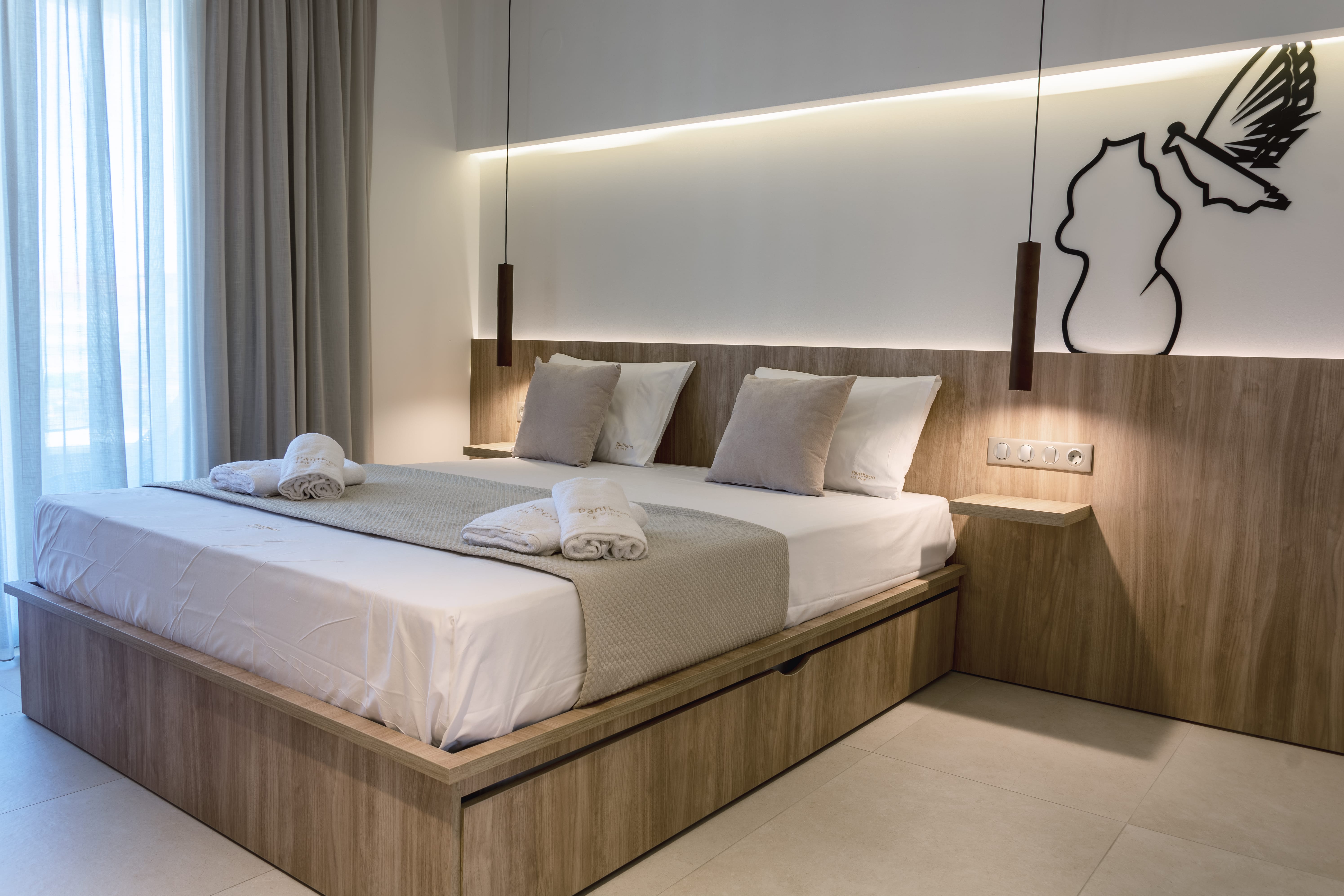 a bed with white sheets