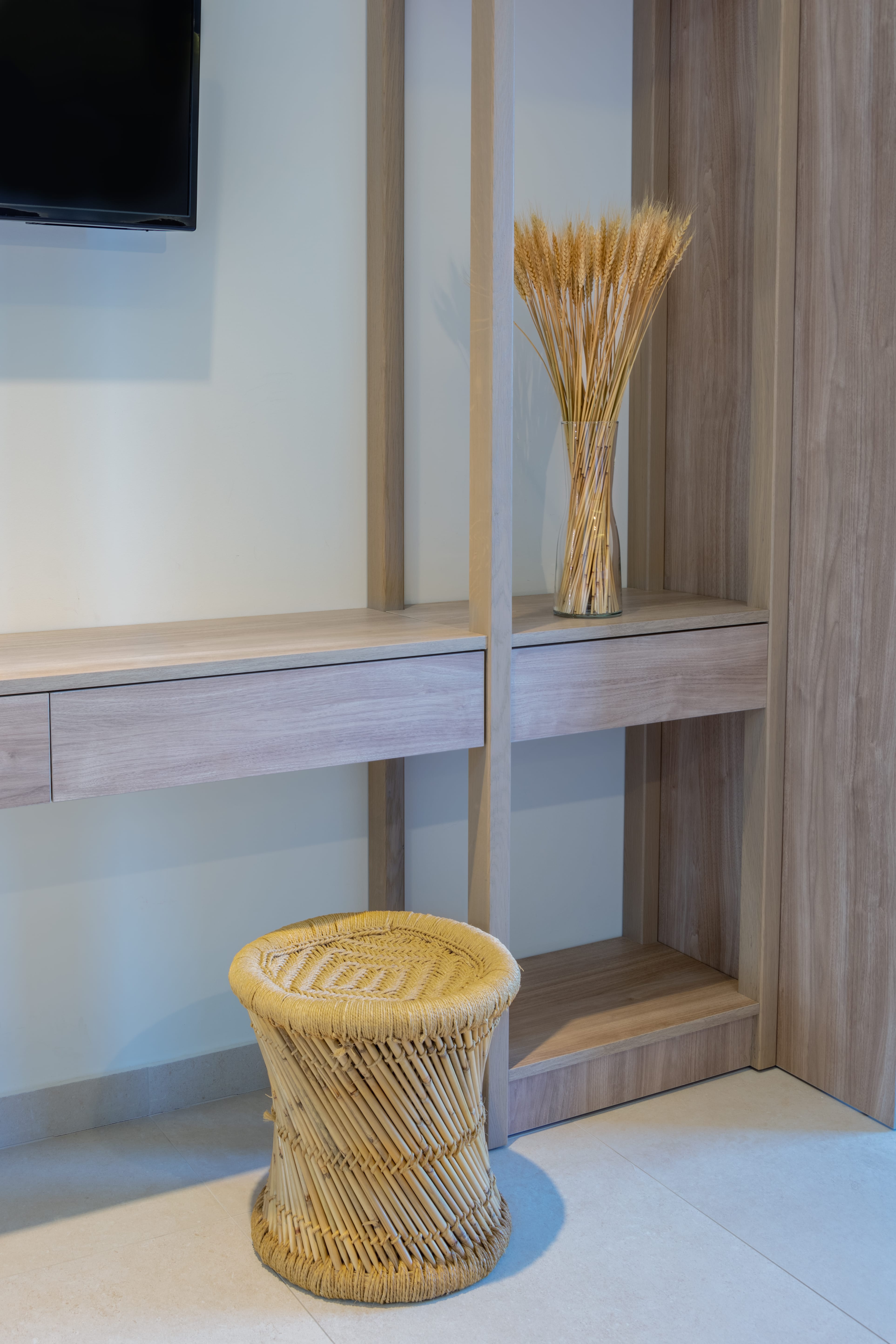 a wooden vase with a plant in it