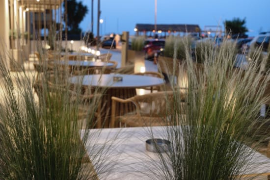 a row of boats on a dock