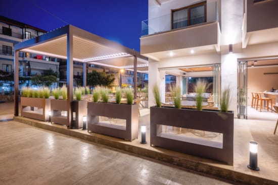 a building with a pool and a deck