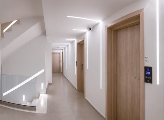 a hallway with white walls