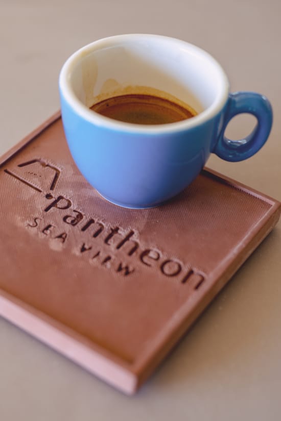 a cup of coffee and a book