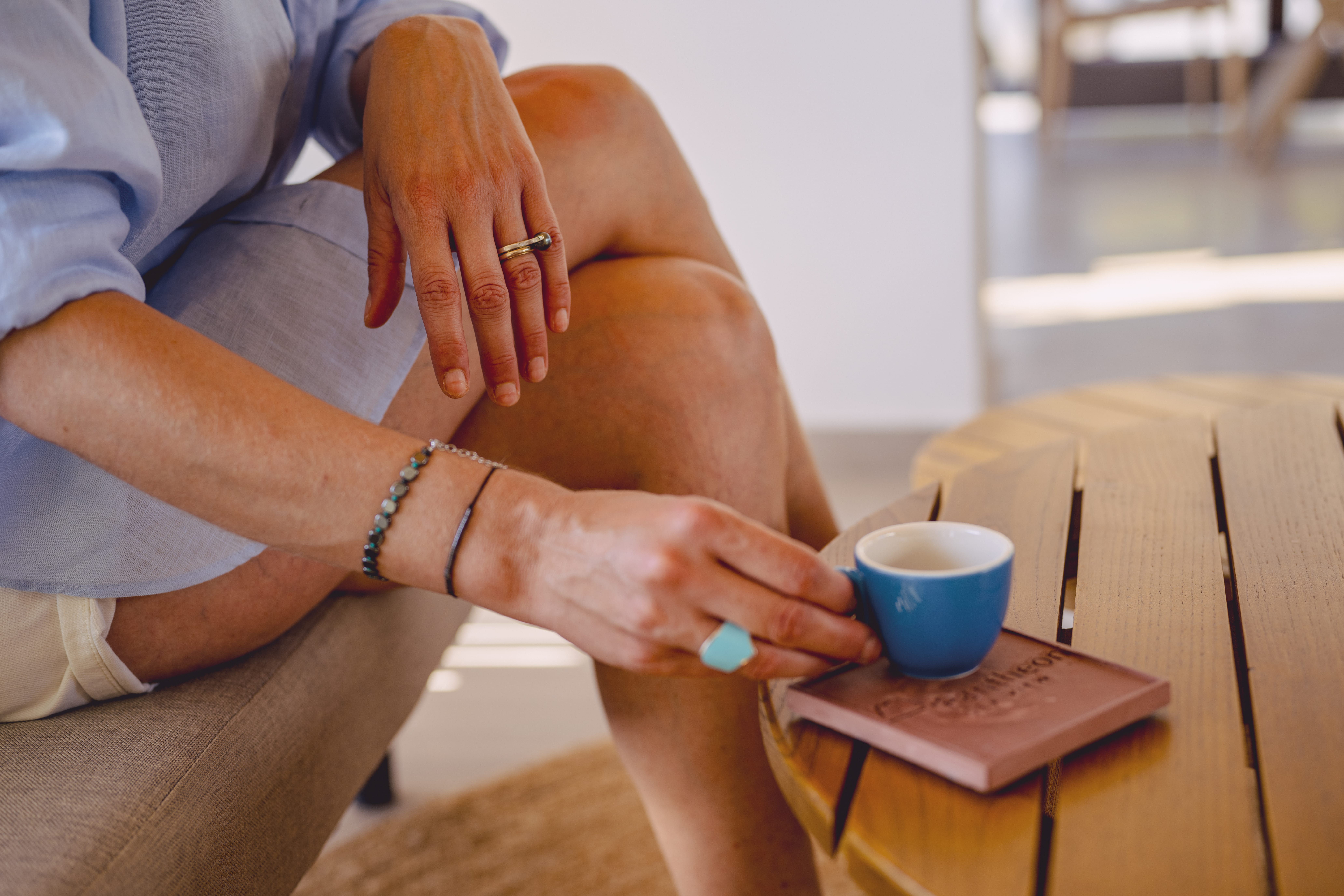 a person holding a cup