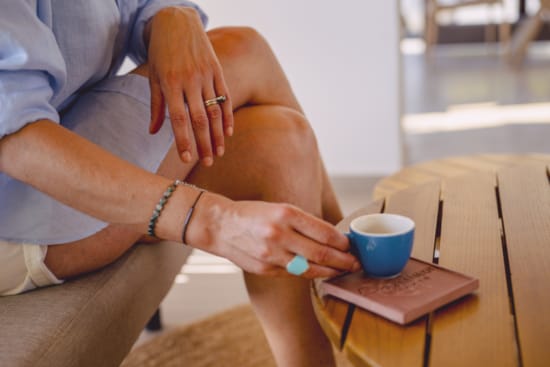 a person holding a cup
