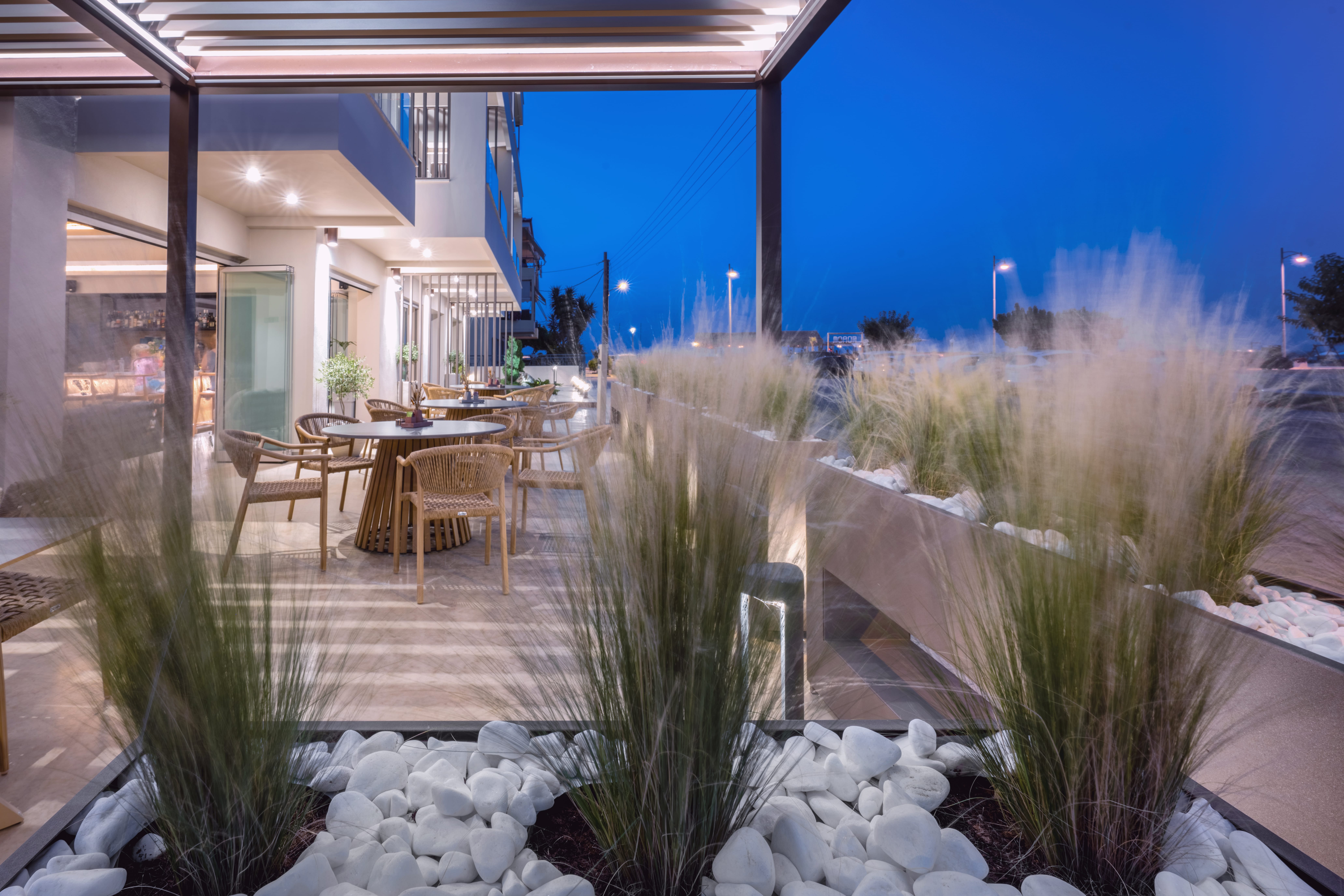 a patio with a table and chairs