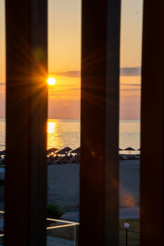 a view of the ocean through a window