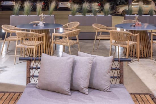 a group of pillows on a patio