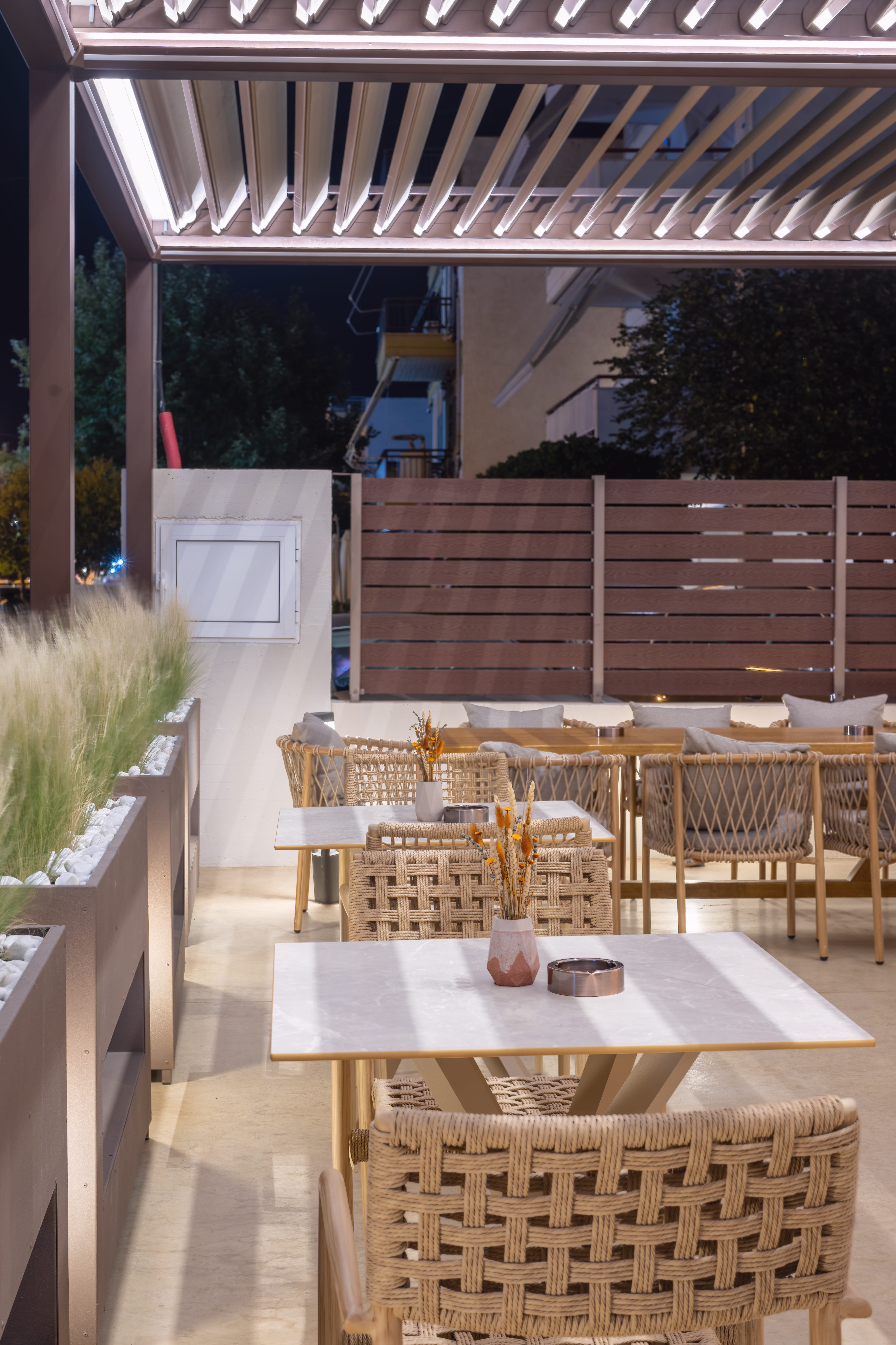 a table with chairs and a refrigerator