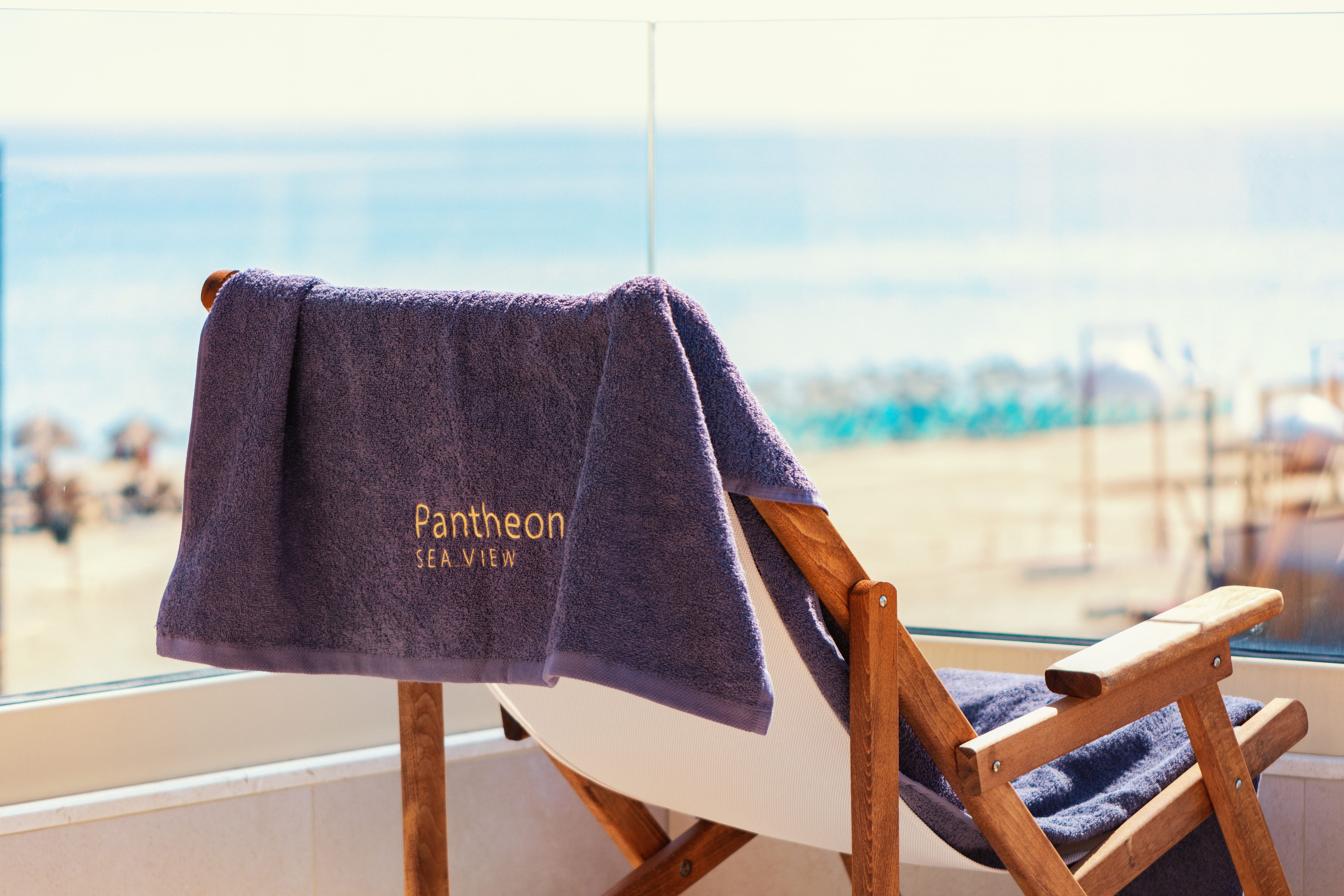 a blue and black flag on a wooden chair