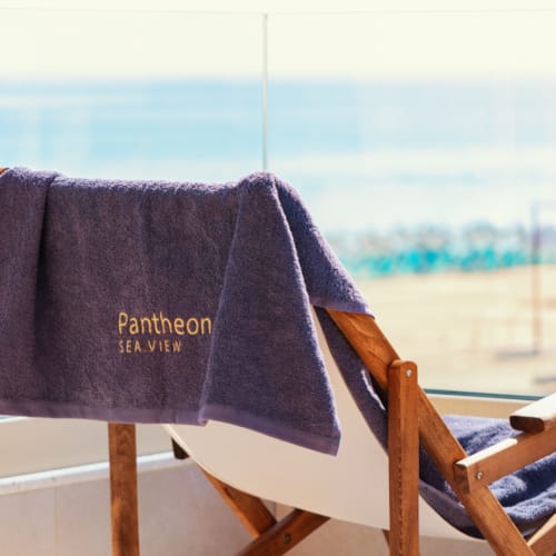 a blue and black flag on a wooden chair