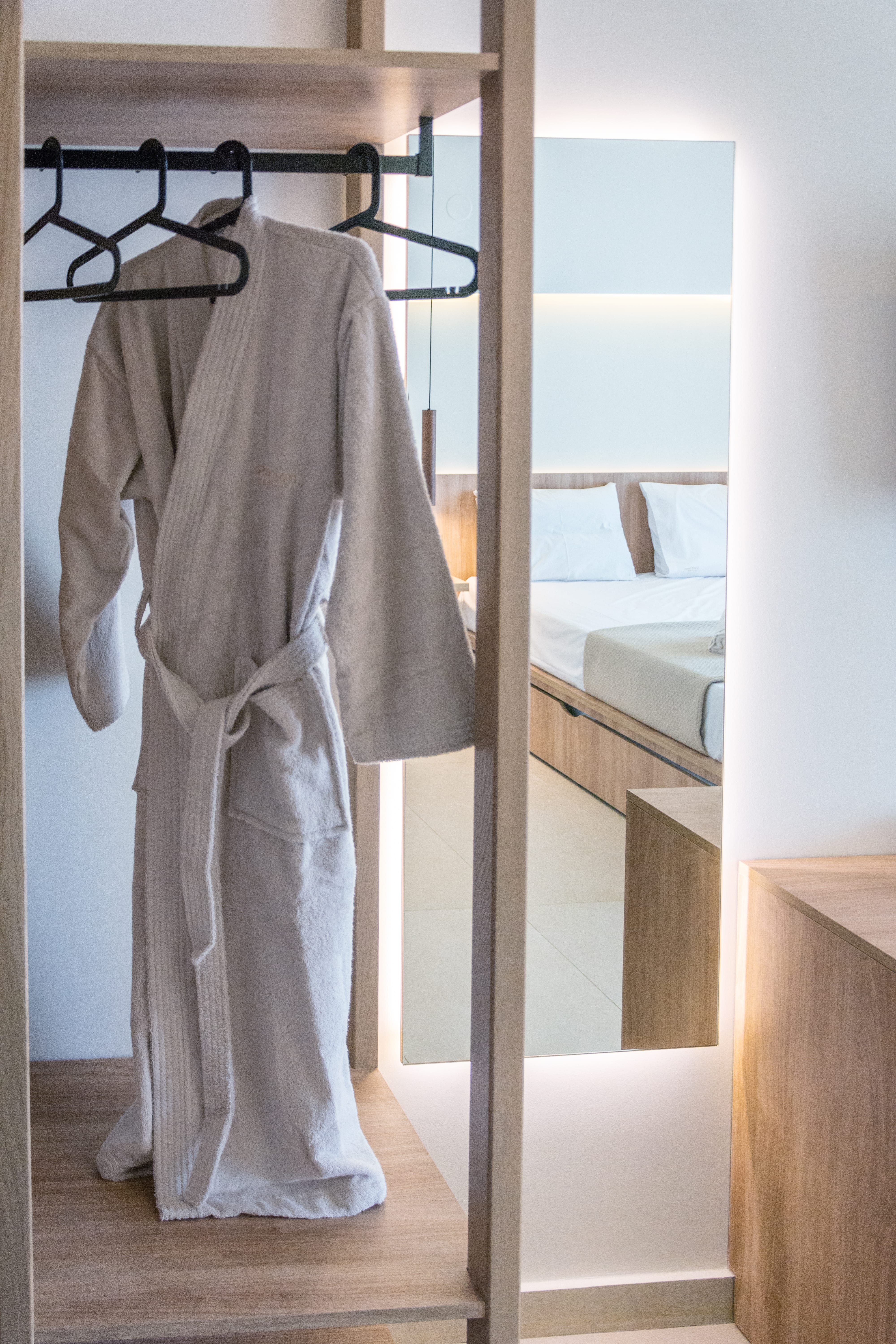 a white robe on a swinger