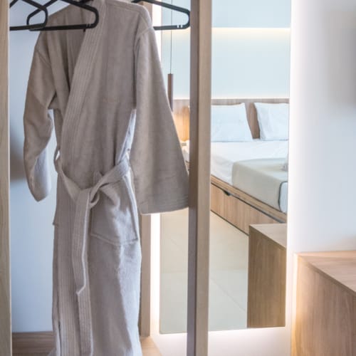 a white robe on a swinger