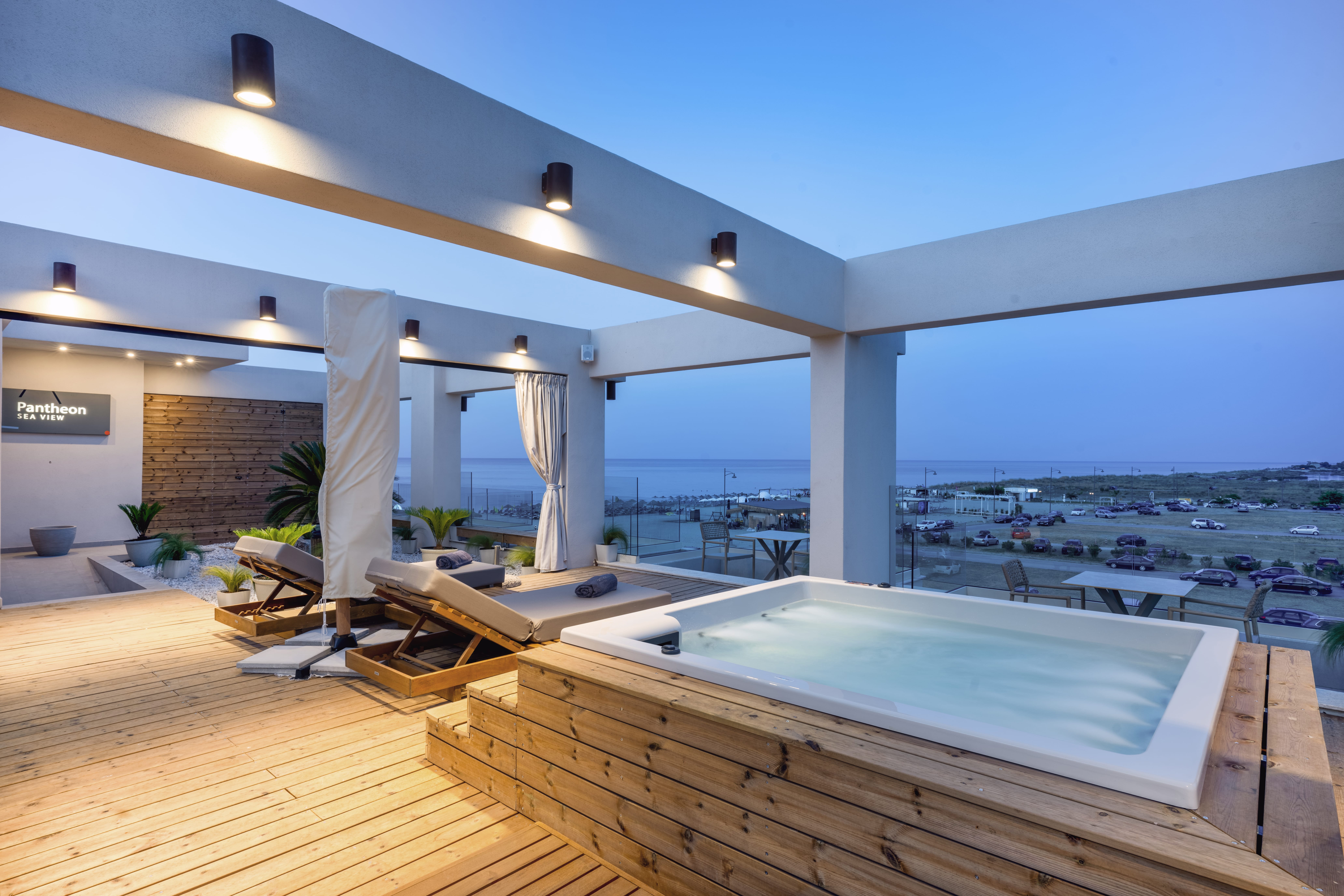 a pool with a deck and chairs