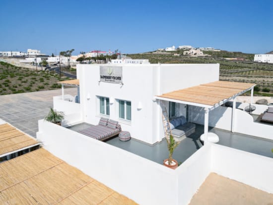 a white house with a pool