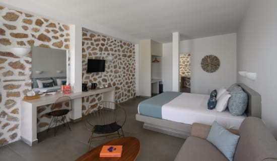 a living room with a couch and a table