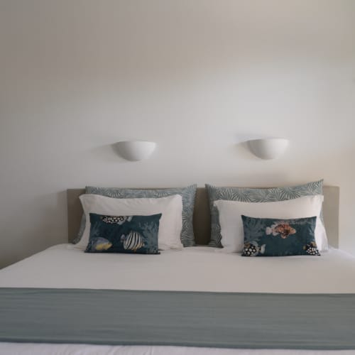 a bed with pillows