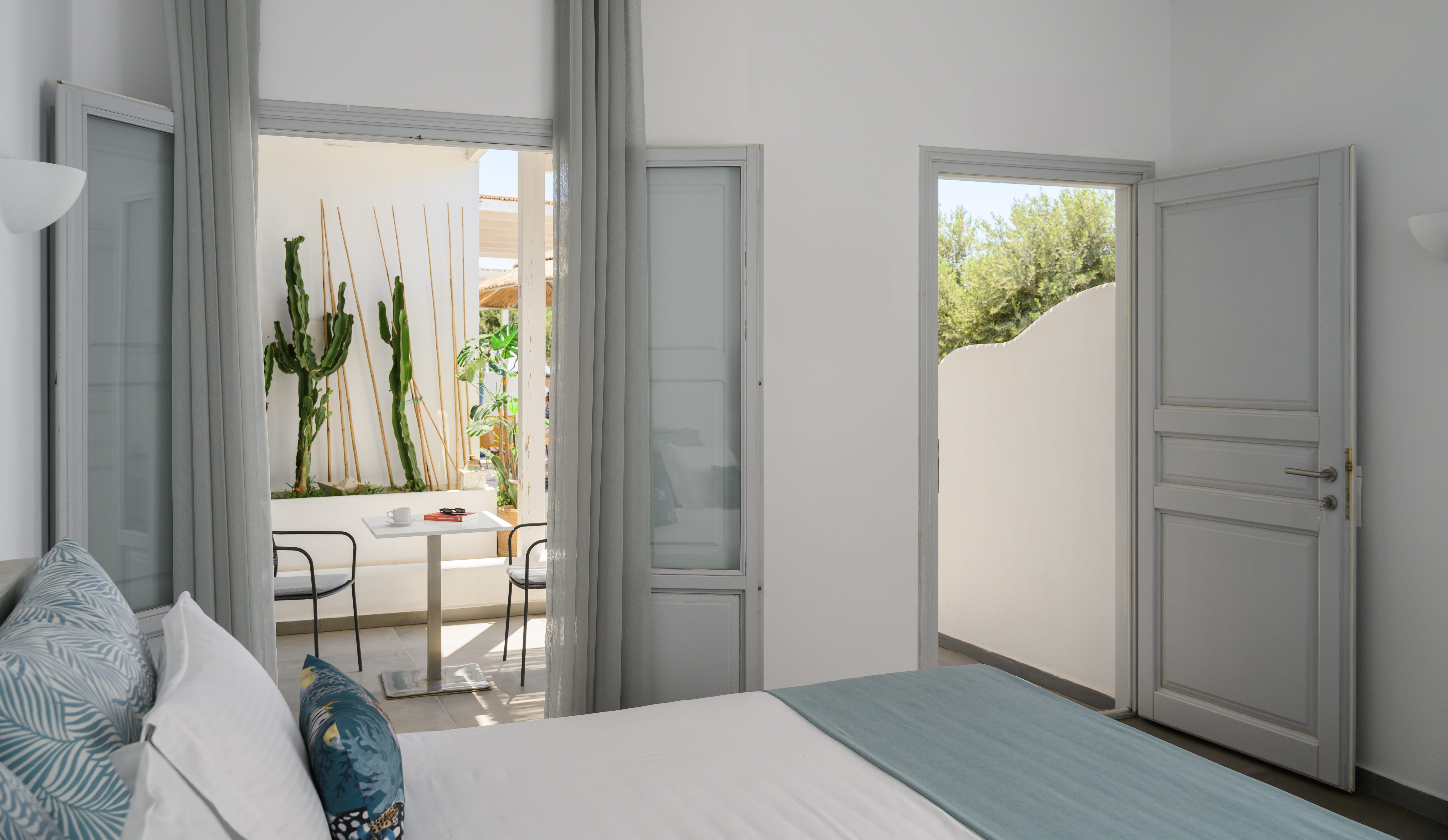 a room with a table and chairs