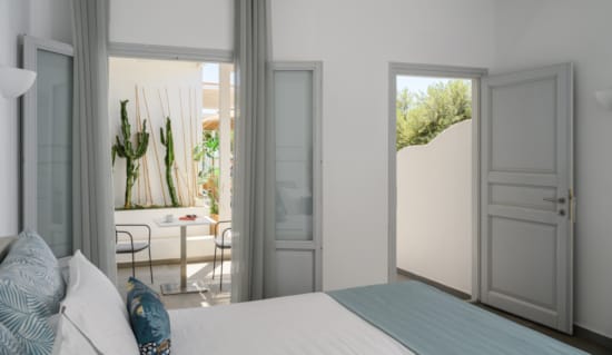 a room with a table and chairs