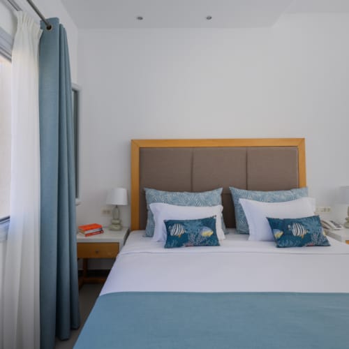 a bed with pillows