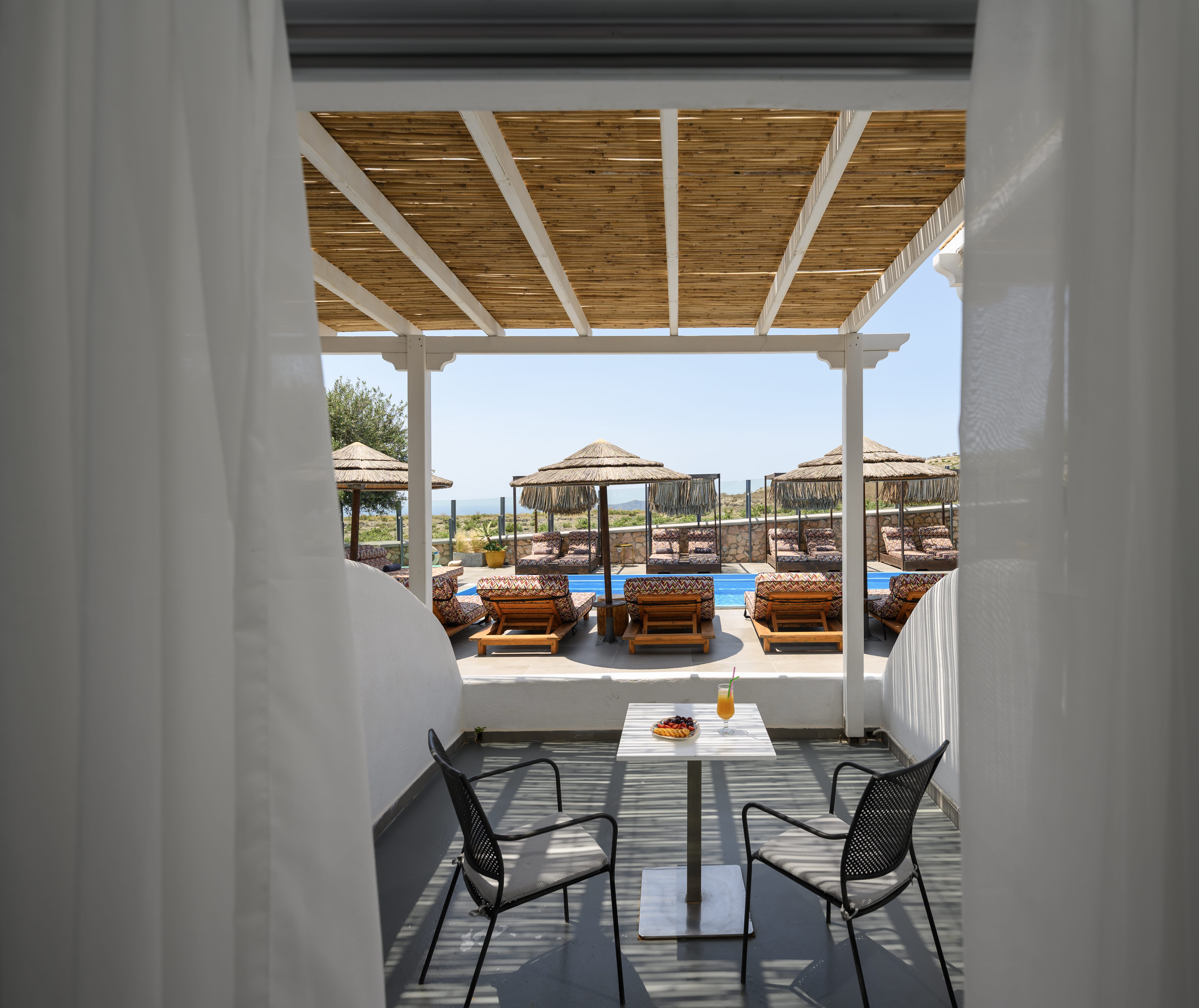 a room with a table and chairs