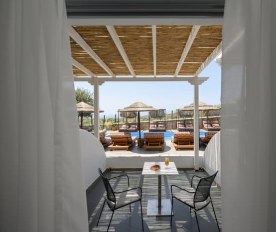 a room with a table and chairs