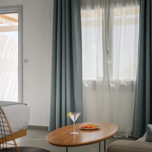 a table with chairs and a window