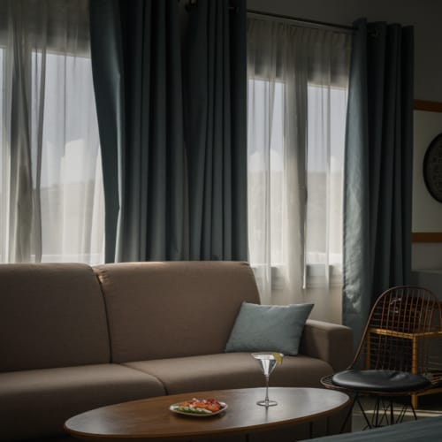 a living room with a couch and a table