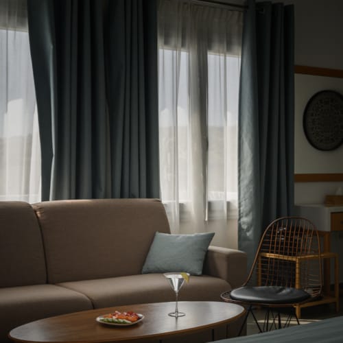 a living room with a couch and a table