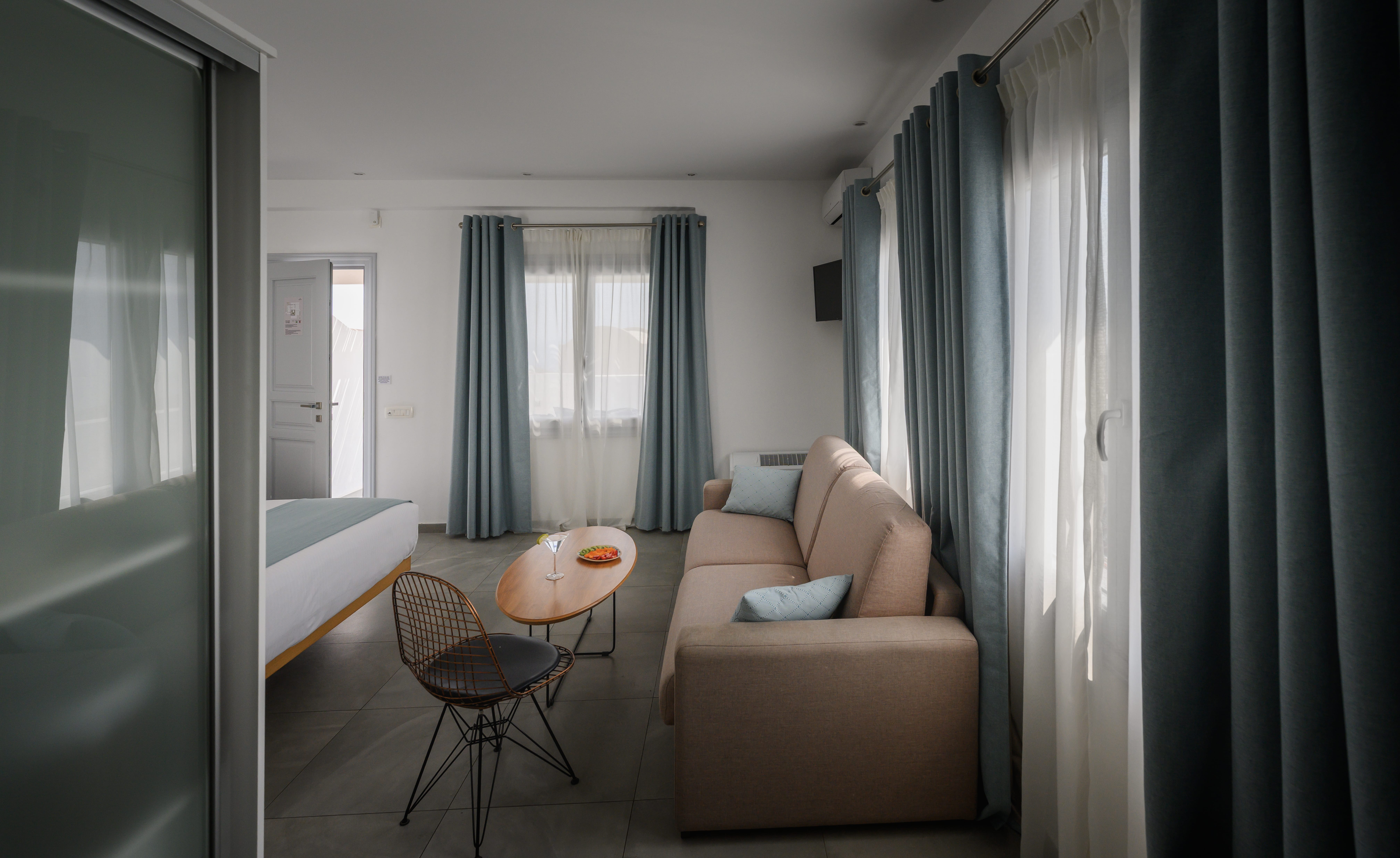 a living room with a couch and a table