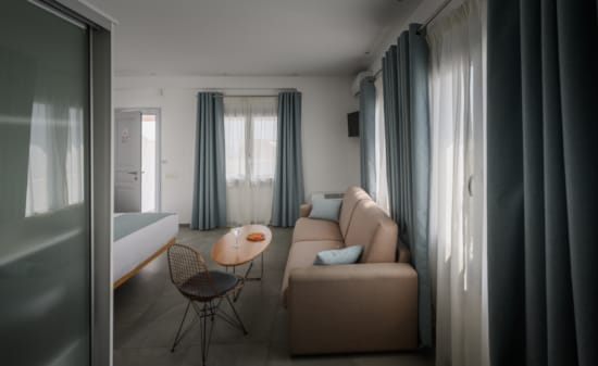 a living room with a couch and a table