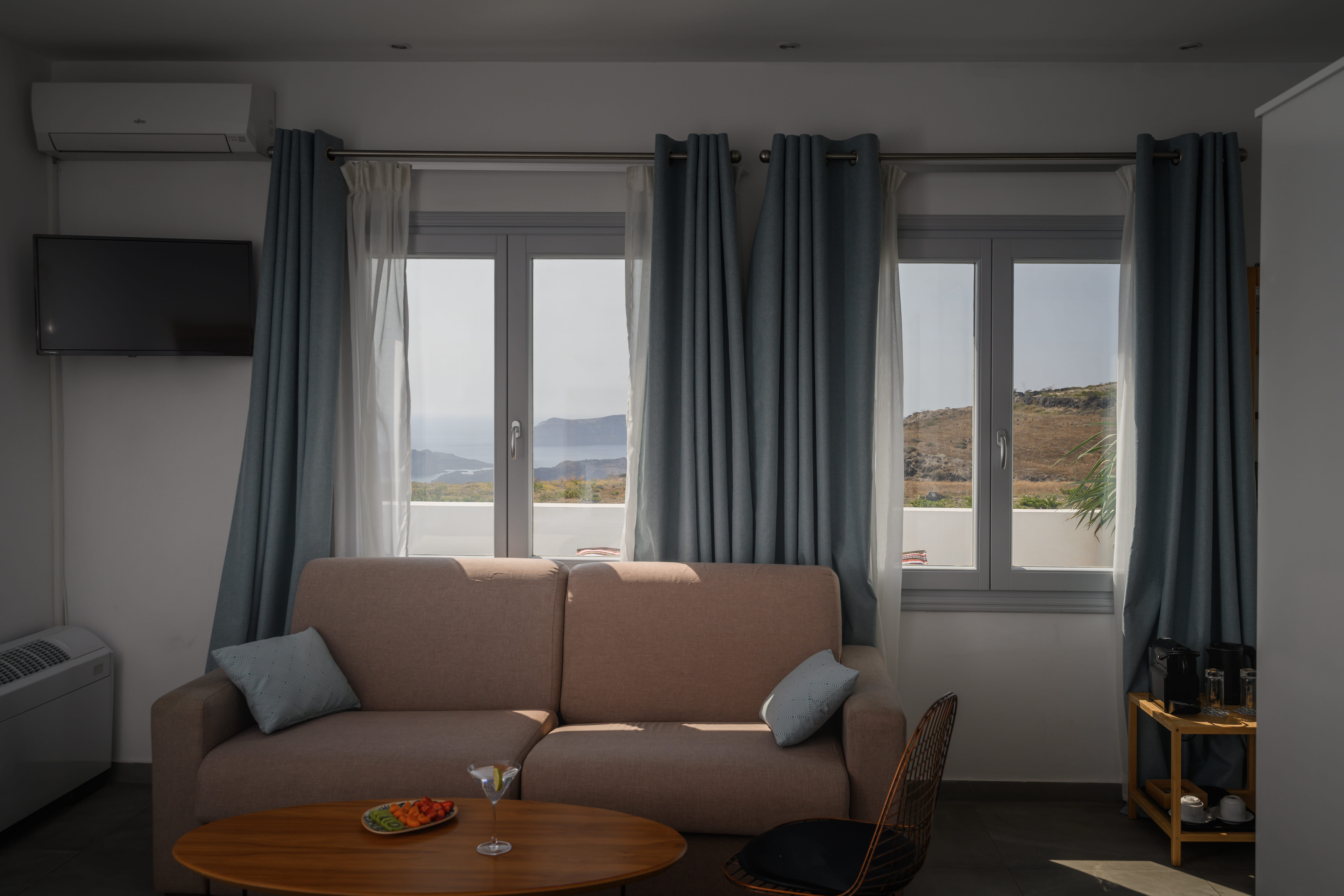 a living room with a couch and a table