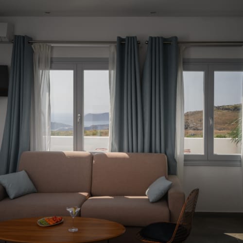 a living room with a couch and a table