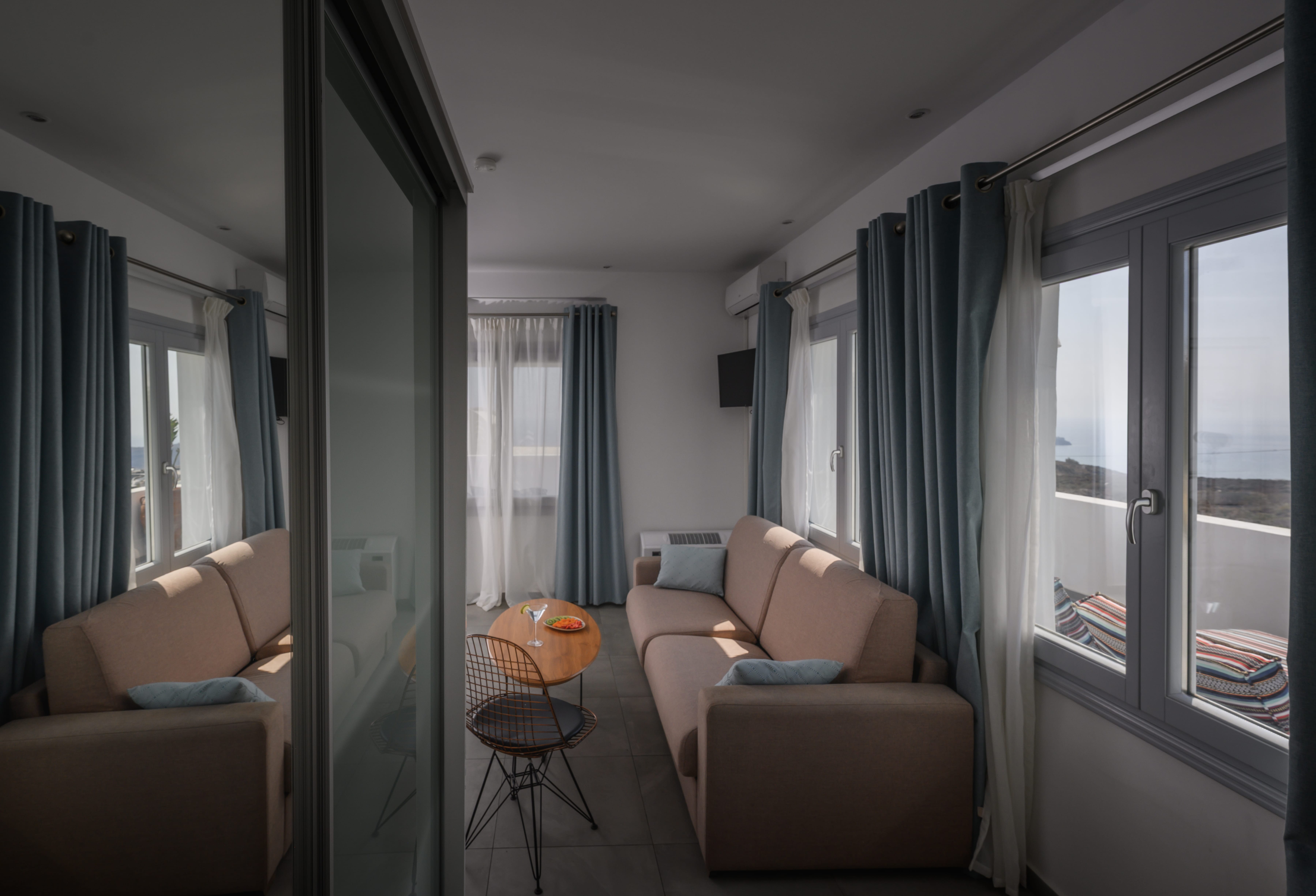 a living room with a couch and a table