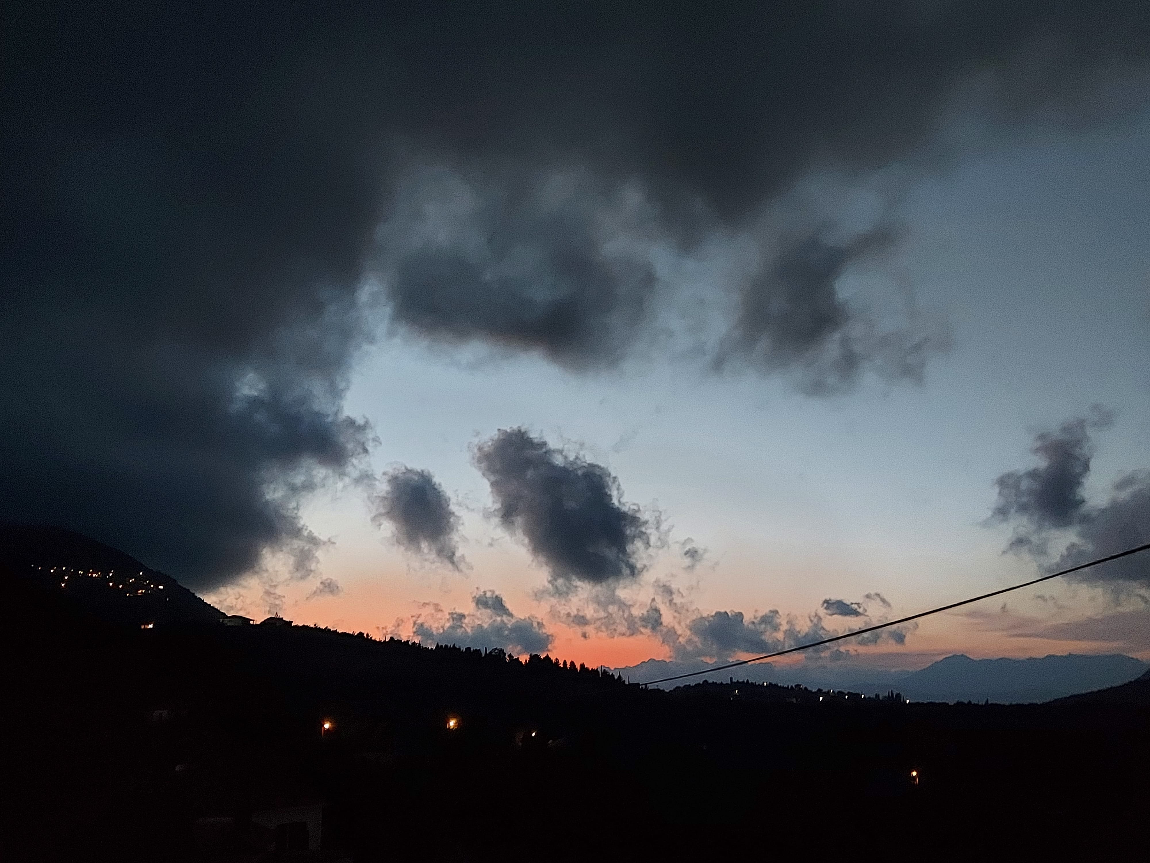 a cloudy sky over a city