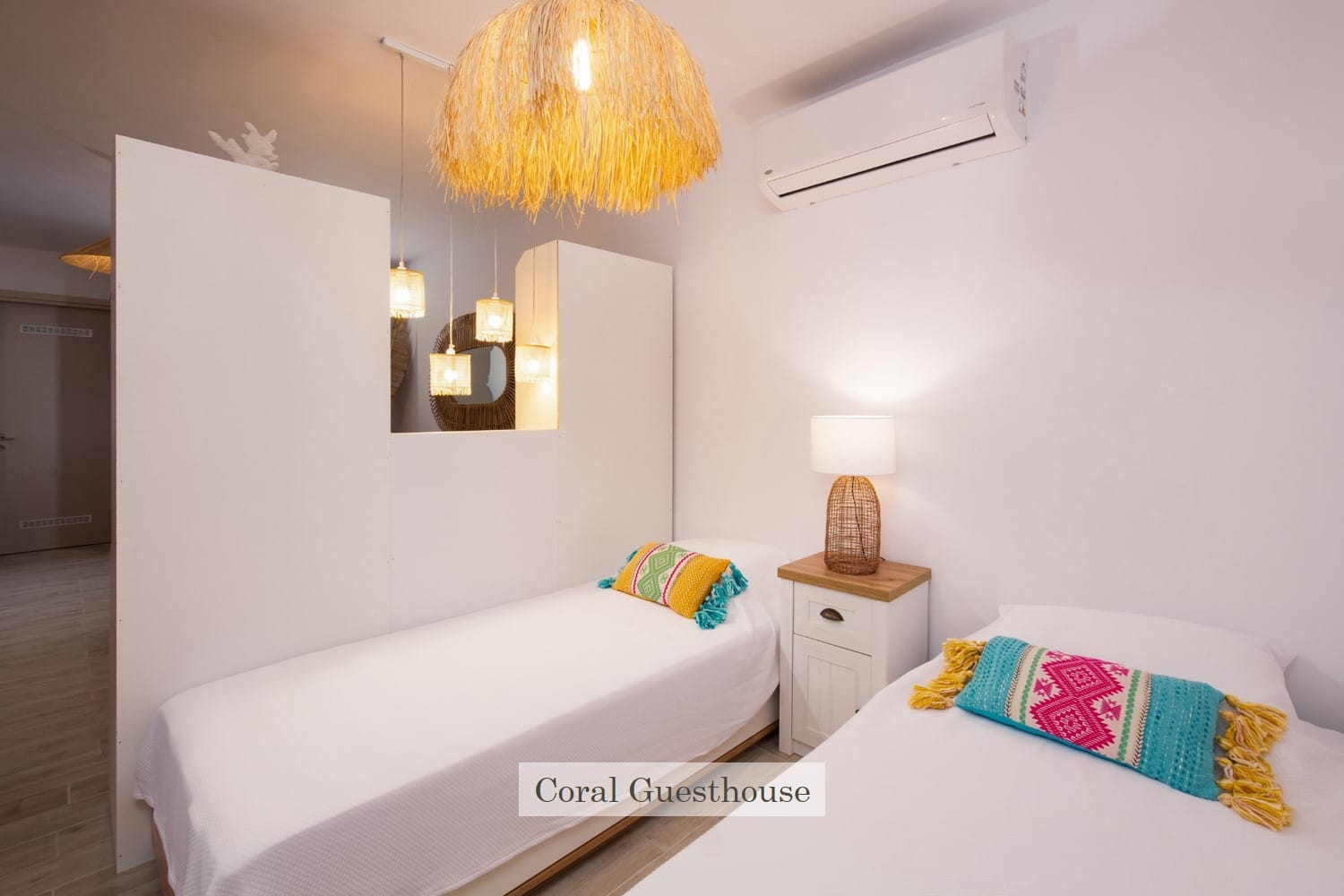 a room with a bed and a lamp