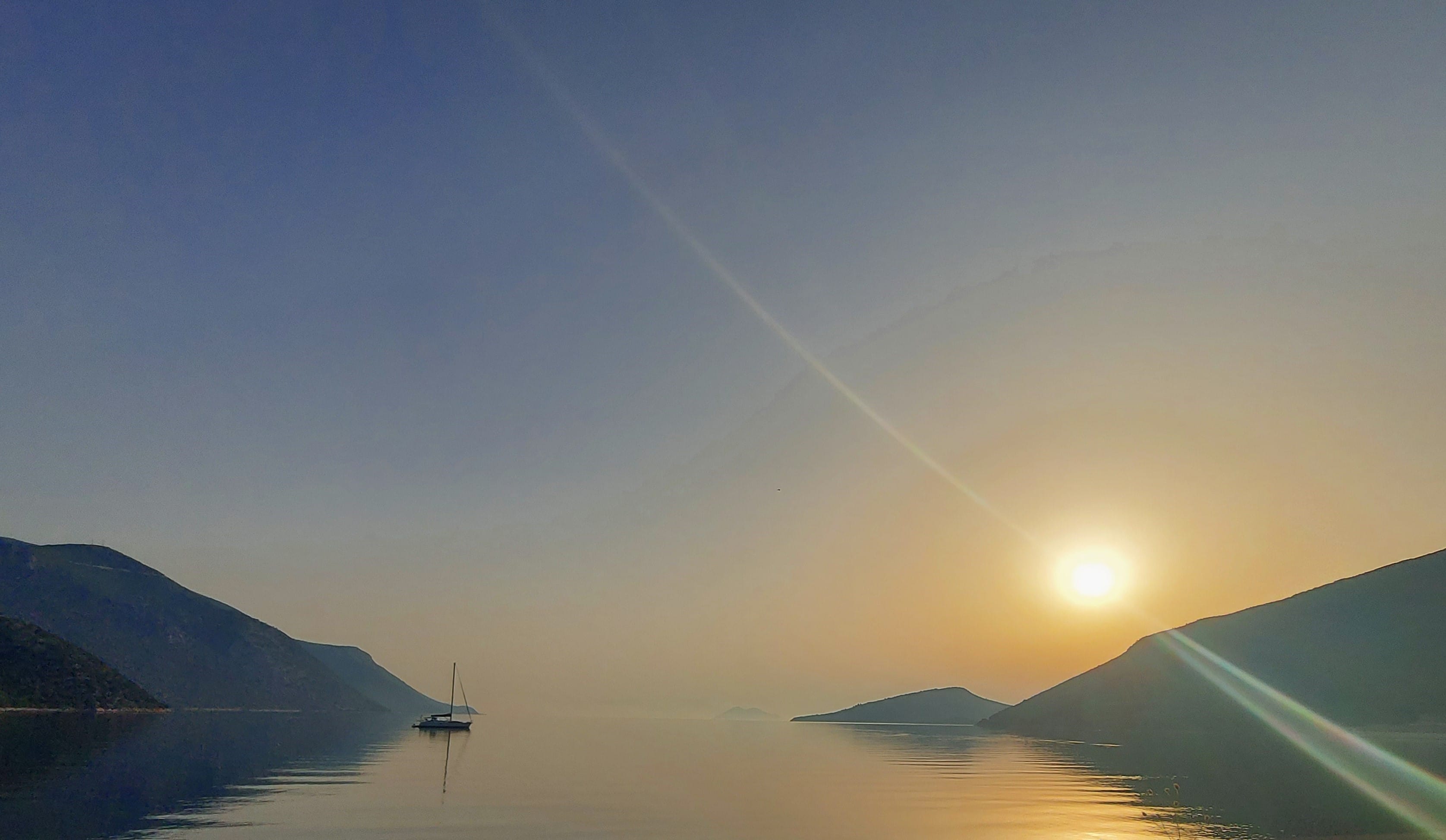 a sunset over a beach