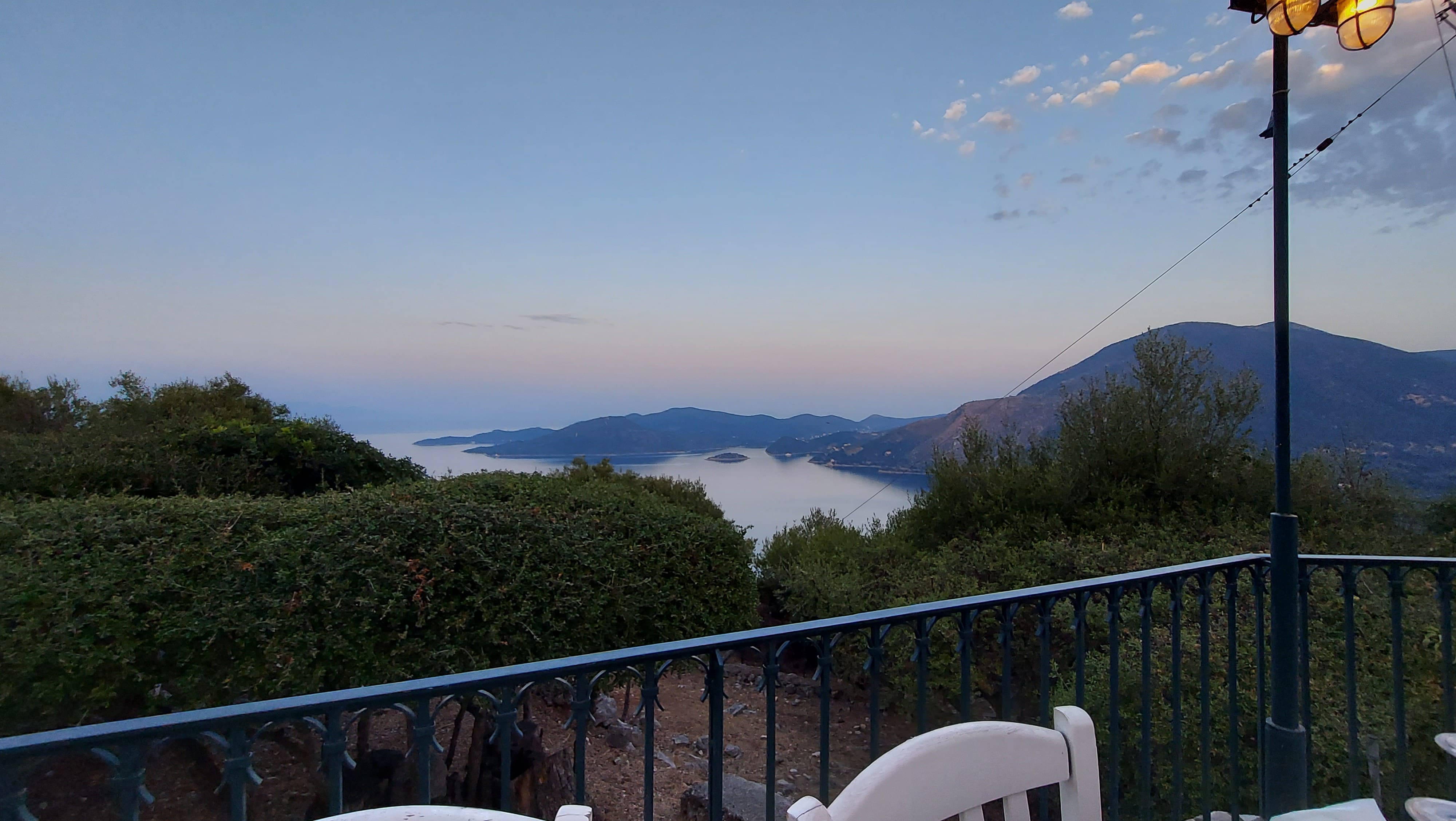 a balcony overlooking a lake