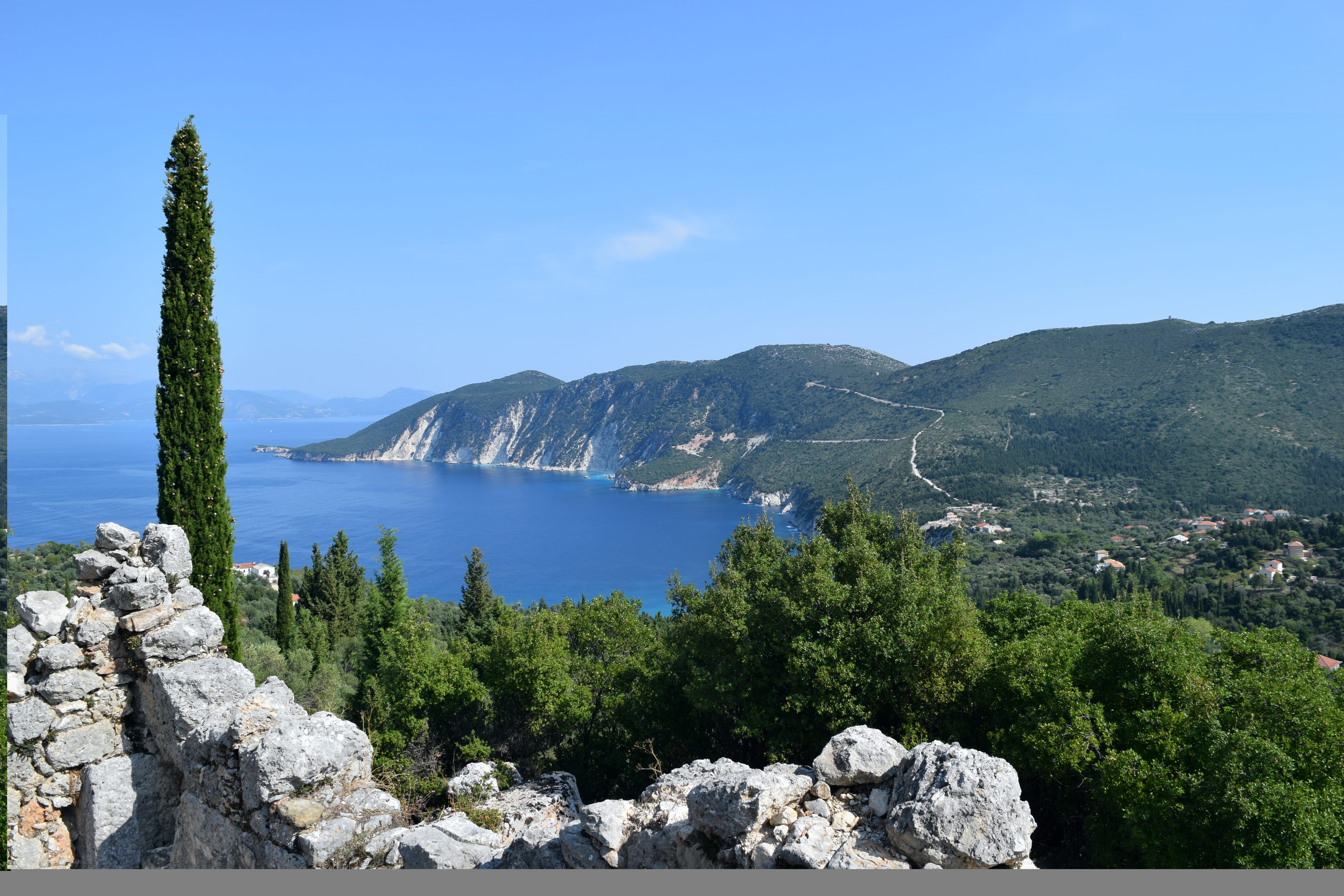 a view of a lake and mountains