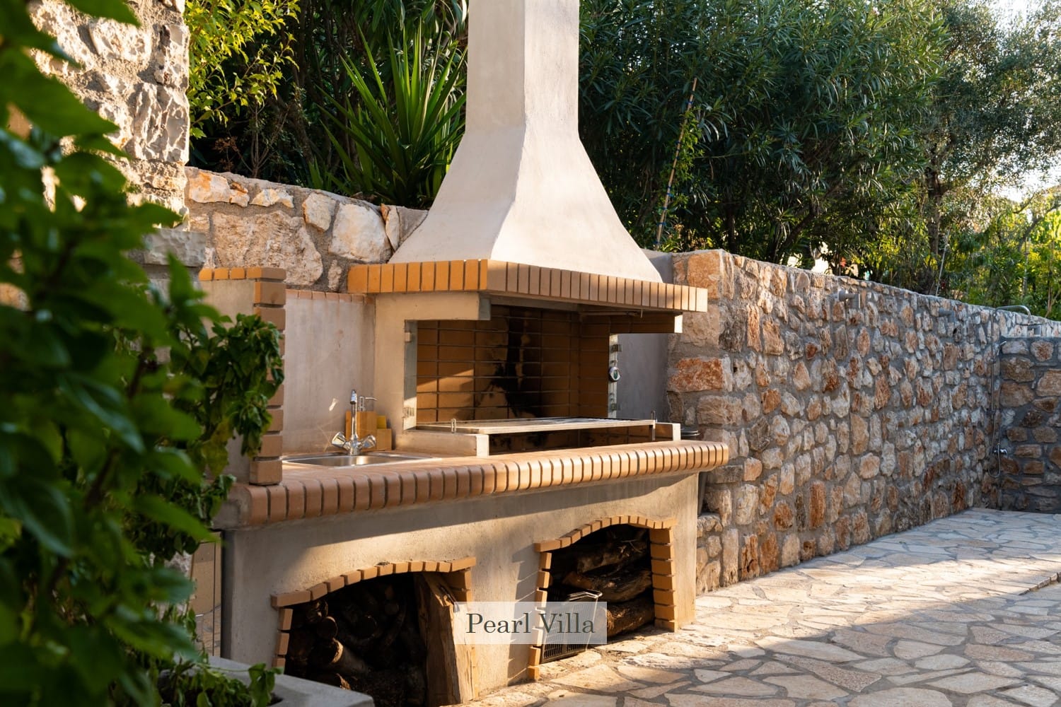 a stone building with a pointed roof