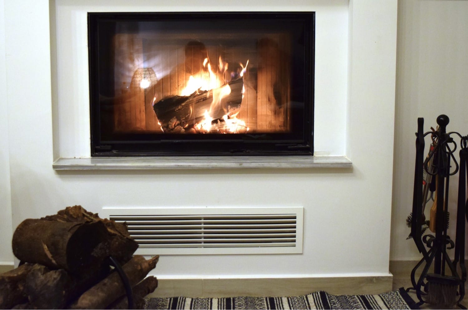 a fireplace with a fire in it